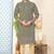 Olive green embroidered kurta with gold pajama—perfect for festive occasions.