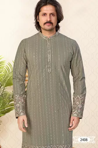 Olive green embroidered kurta with gold pajama—perfect for festive occasions.