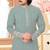 Sage green kurta with floral embroidery, paired with gold pajama—perfect for festive occasions.