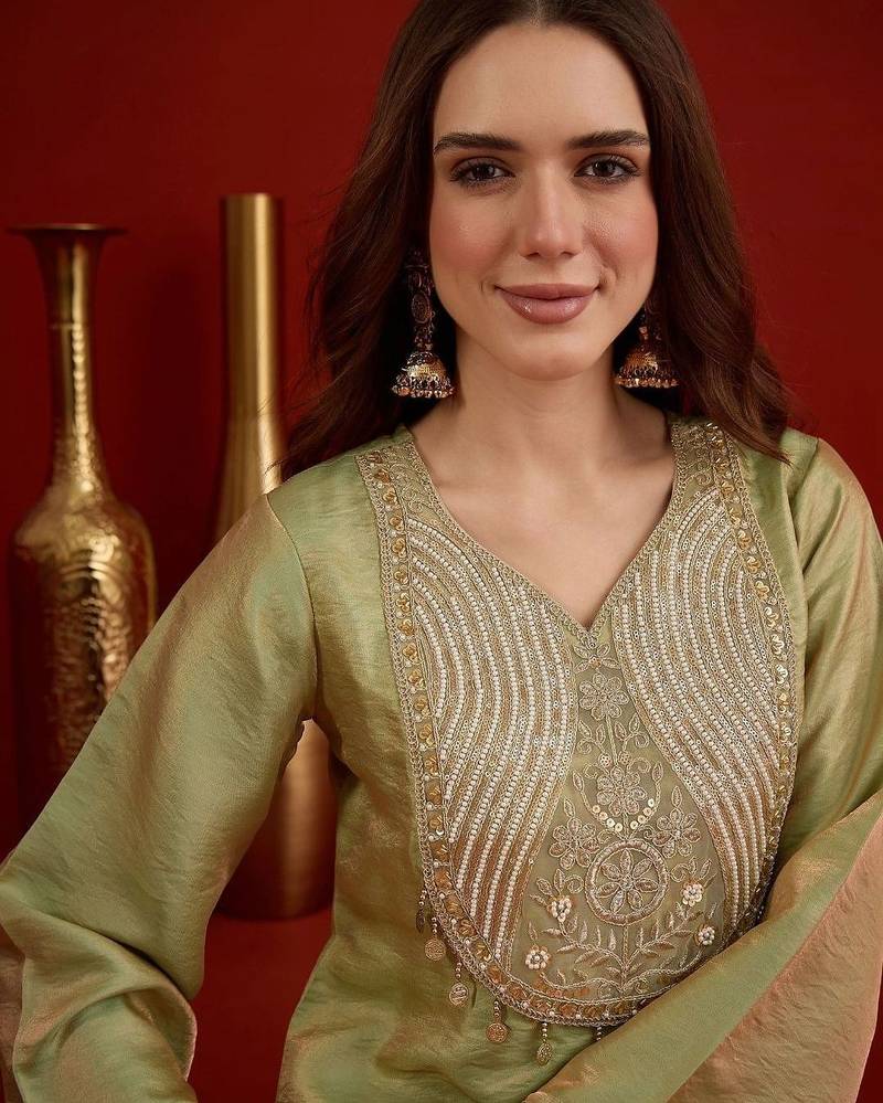 women ethnic motifs embroidered kurta wtih farshi salwar
