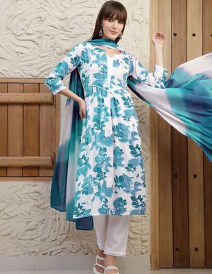 women floral printed regular  cotton kurta with trousers & with dupatta 1