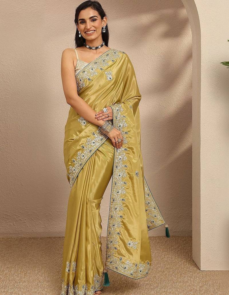 olive floral zari embroidered saree with a blouse piece