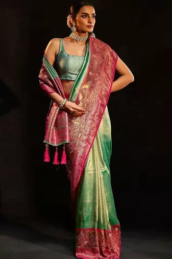 green woven design silk blend saree