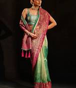 green woven design silk blend saree