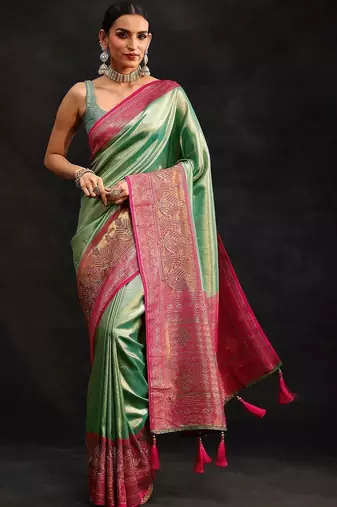 green woven design silk blend saree
