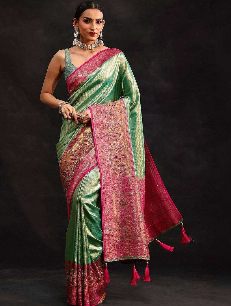 green woven design silk blend saree