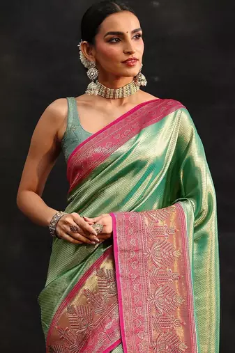 green woven design silk blend saree