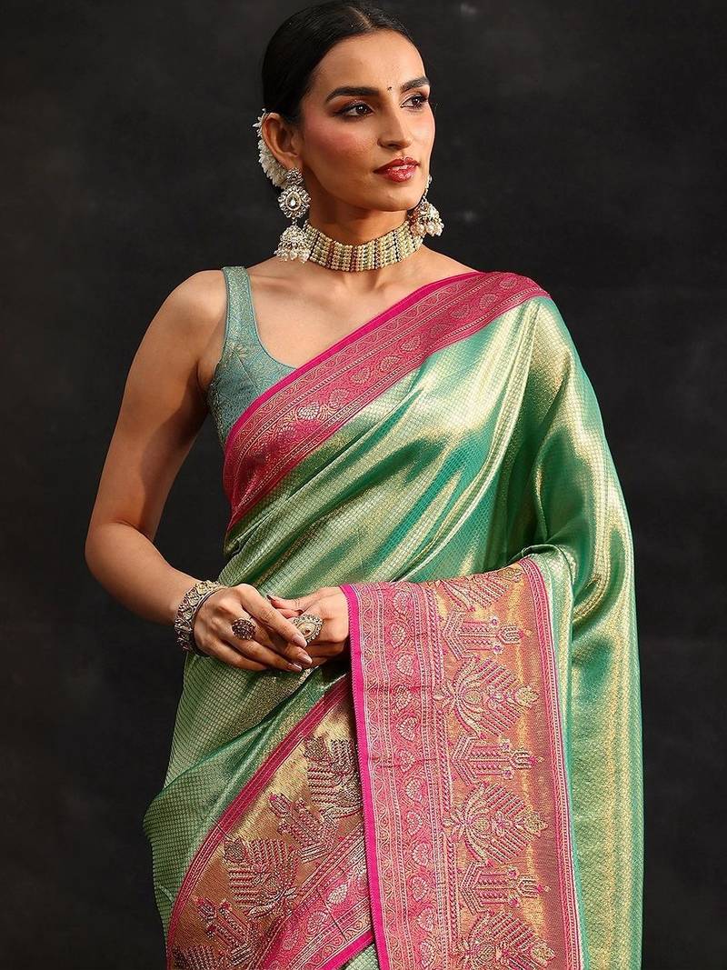 green woven design silk blend saree
