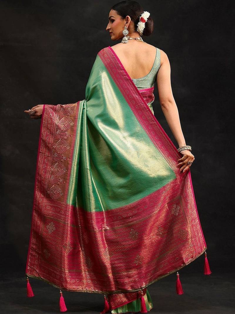 green woven design silk blend saree