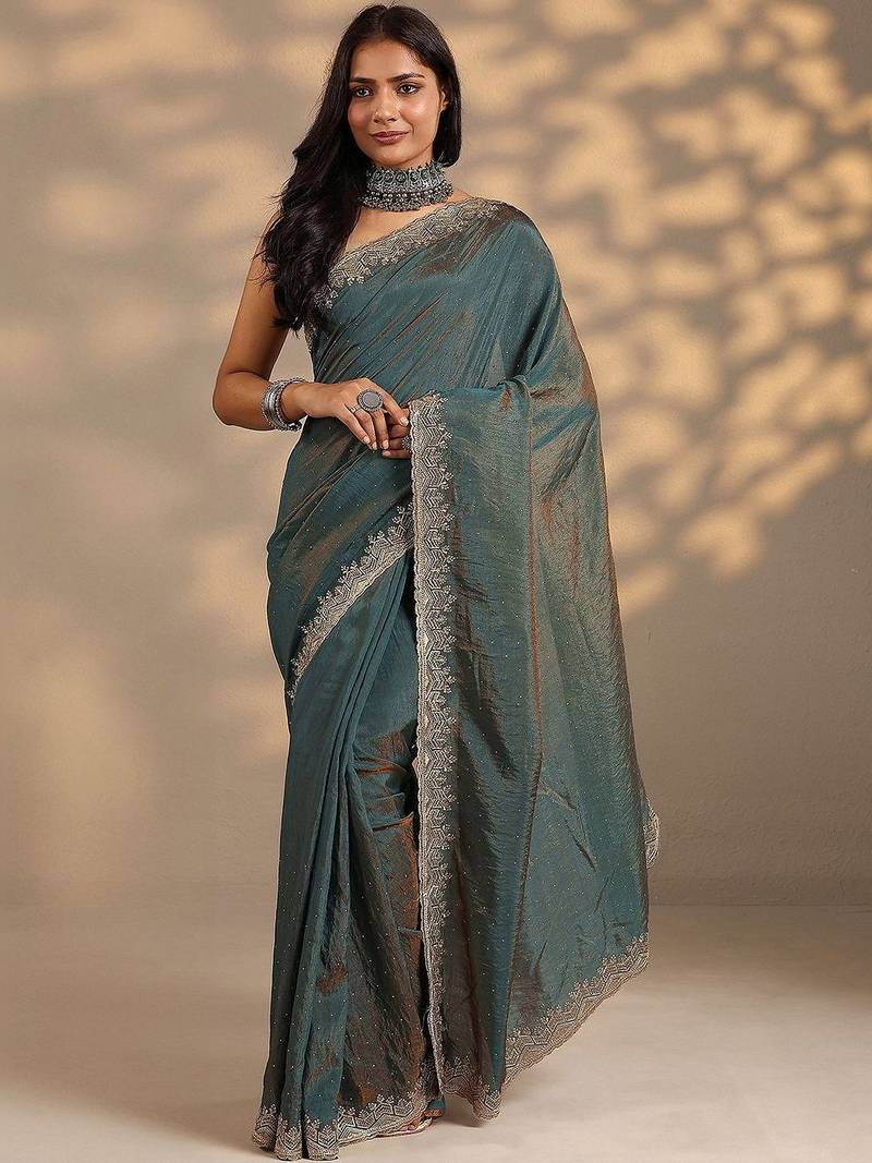teal embellished saree with unstitched blouse piece