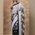 black animal printed satin saree with unstitched blouse piece
