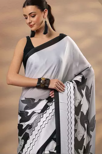 black animal printed satin saree with unstitched blouse piece