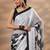 black animal printed satin saree with unstitched blouse piece