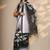black animal printed satin saree with unstitched blouse piece