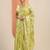 green printed satin saree with unstitched blouse piece