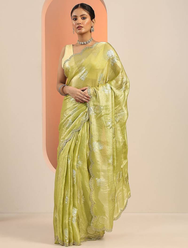 green printed satin saree with unstitched blouse piece