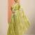 green printed satin saree with unstitched blouse piece