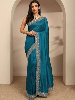 teal beads embellished saree with zari embellished border and a blouse piece 1