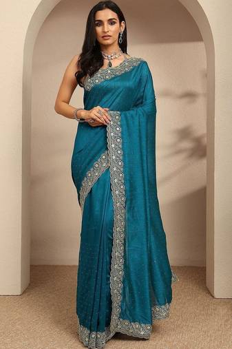 teal beads embellished saree with zari embellished border and a blouse piece