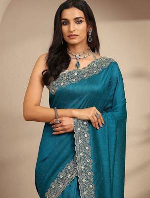 teal beads embellished saree with zari embellished border and a blouse piece 2