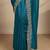teal beads embellished saree with zari embellished border and a blouse piece