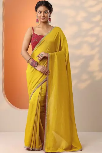 yellow solid saree with unstitched blouse piece