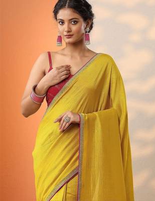 yellow solid saree with unstitched blouse piece 5