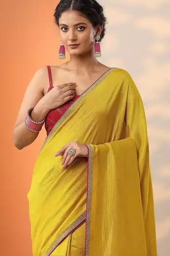 yellow solid saree with unstitched blouse piece