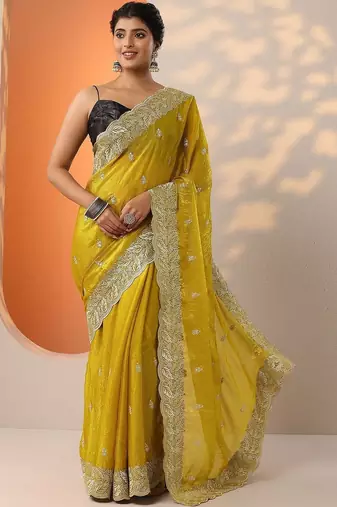 yellow embroidered saree with unstitched blouse piece