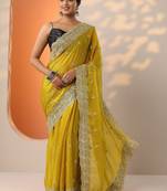 yellow embroidered saree with unstitched blouse piece