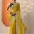 yellow embroidered saree with unstitched blouse piece