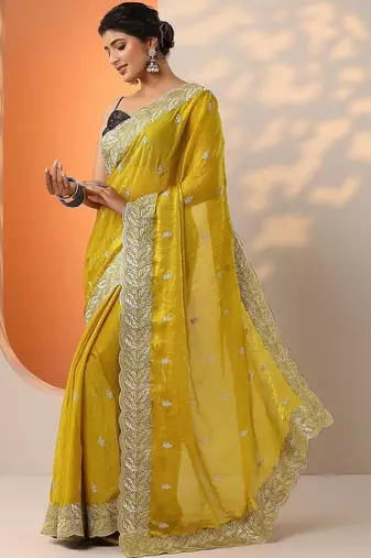 yellow embroidered saree with unstitched blouse piece