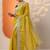 yellow embroidered saree with unstitched blouse piece