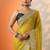 yellow embroidered saree with unstitched blouse piece