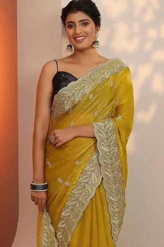 yellow embroidered saree with unstitched blouse piece