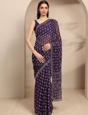 purple ethnic motifs printed saree with unstitched blouse piece 1