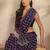 purple ethnic motifs printed saree with unstitched blouse piece