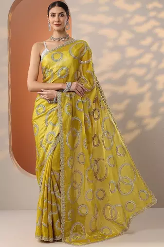yellow embroidered organza saree with unstitched blouse piece