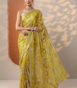 yellow embroidered organza saree with unstitched blouse piece
