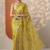 yellow embroidered organza saree with unstitched blouse piece
