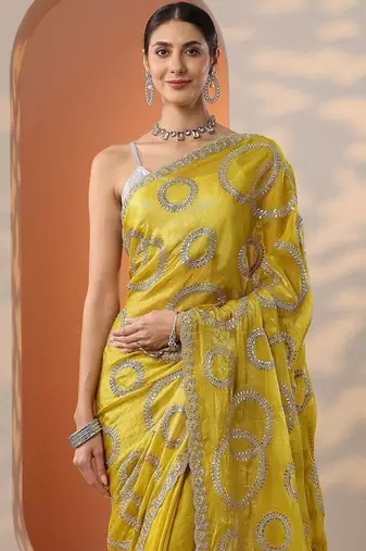 yellow embroidered organza saree with unstitched blouse piece