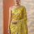 yellow embroidered organza saree with unstitched blouse piece