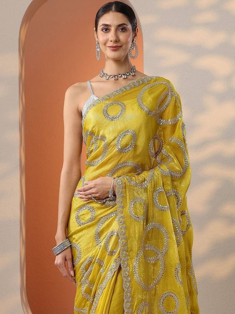yellow embroidered organza saree with unstitched blouse piece