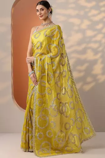 yellow embroidered organza saree with unstitched blouse piece