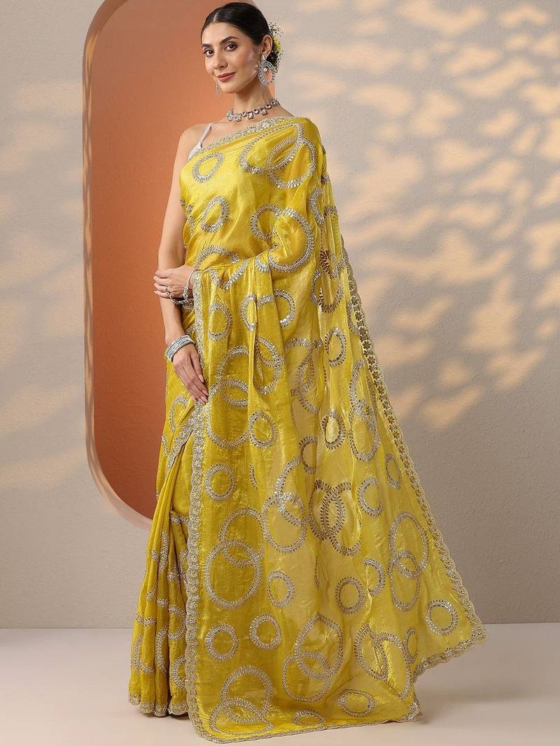 yellow embroidered organza saree with unstitched blouse piece