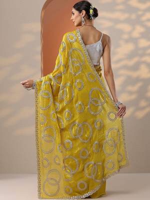 yellow embroidered organza saree with unstitched blouse piece 4