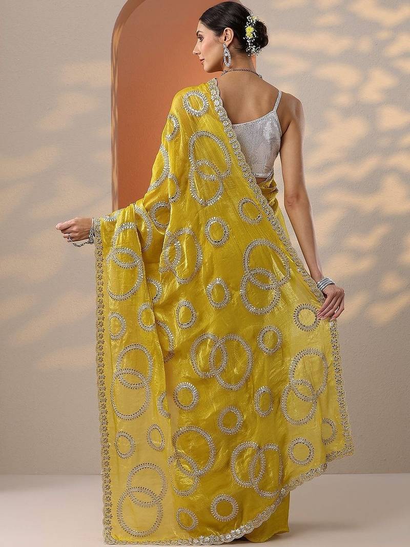 yellow embroidered organza saree with unstitched blouse piece