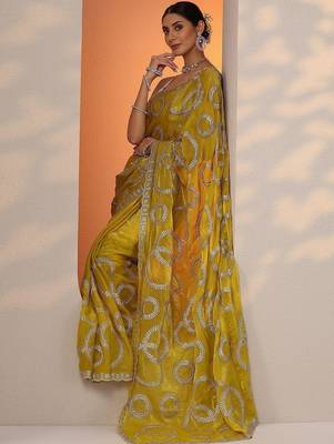 yellow embroidered organza saree with unstitched blouse piece 5