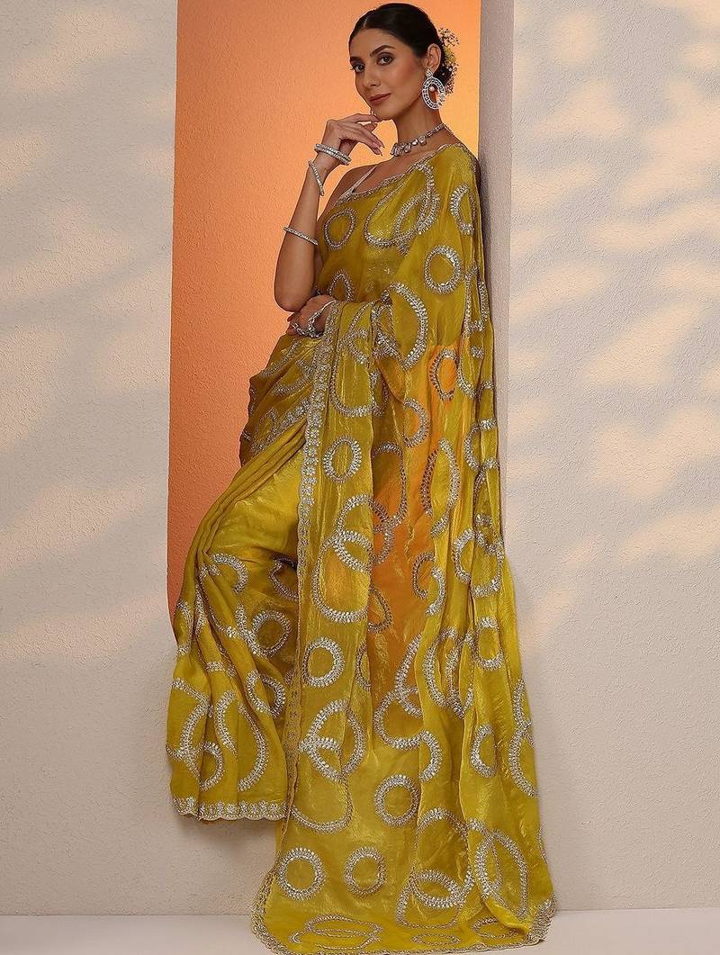 yellow embroidered organza saree with unstitched blouse piece