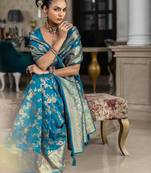 blue woven design saree with unstitched blouse piece